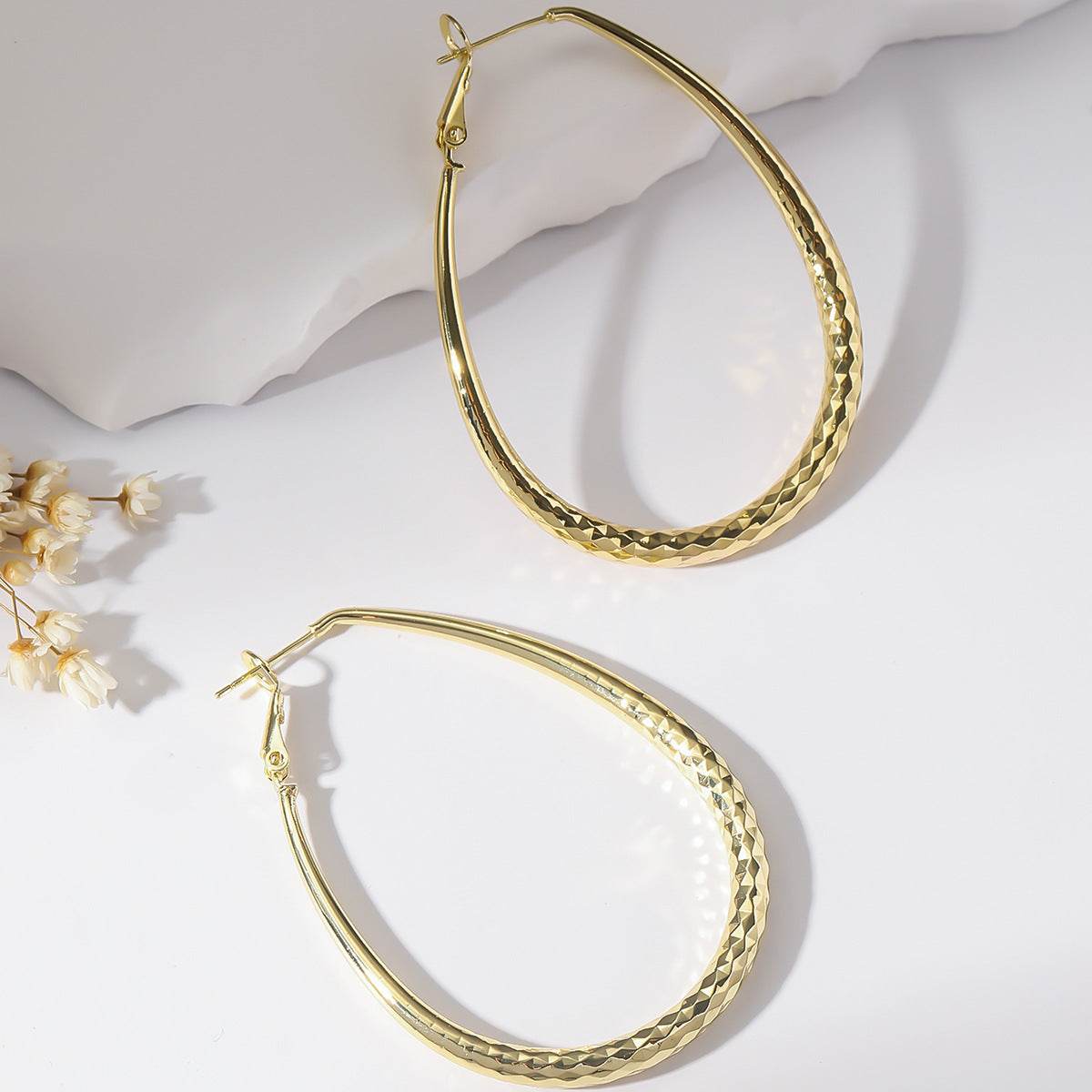 Golden Glossy Spring Fastener Egg-shaped Earrings Hypoallergenic Copper - P12 Hub Europe