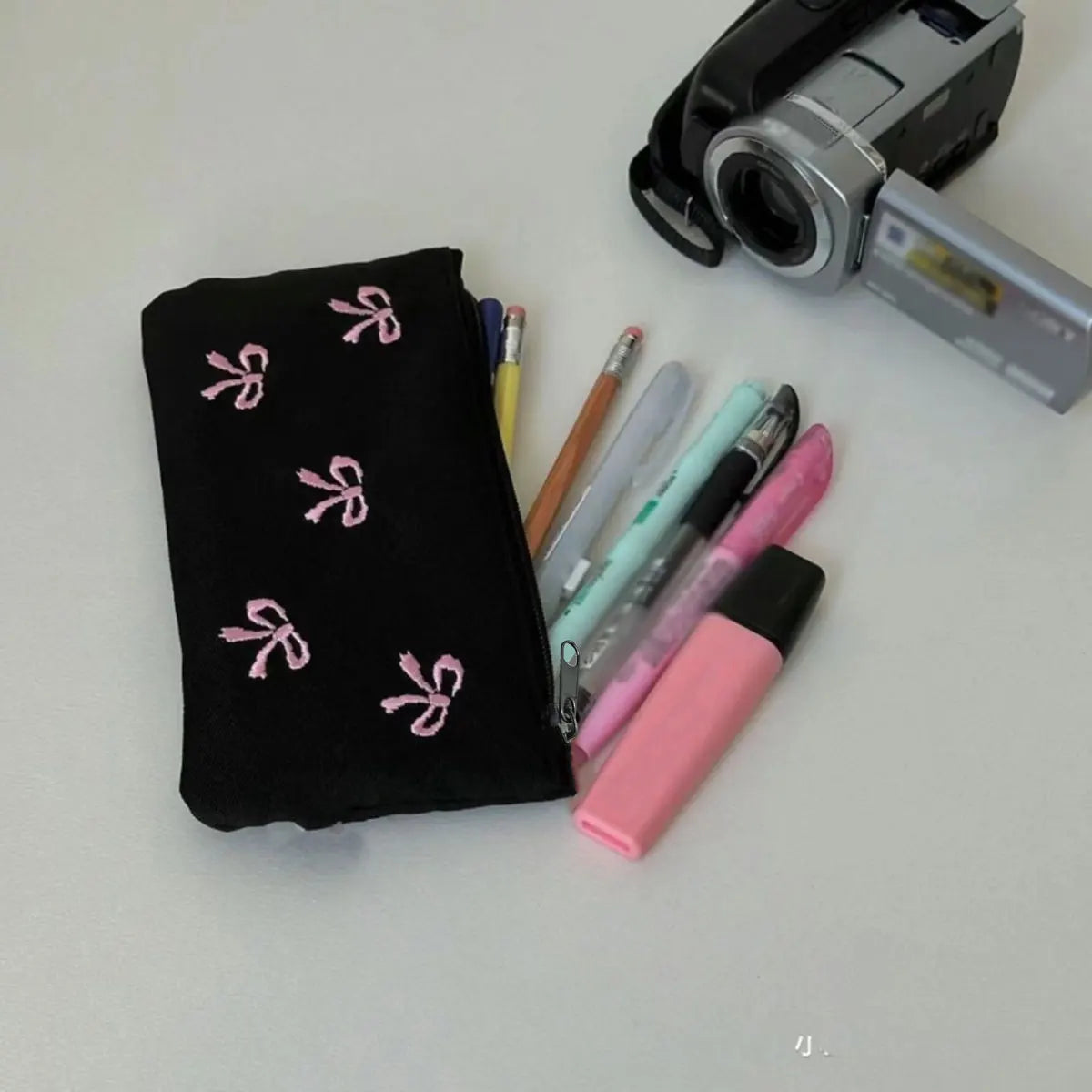 Black bow embroidery pen bag High appearance level Cosmetic storage bag Simple ins cosmetic bag 1 pack (zipper direction random)