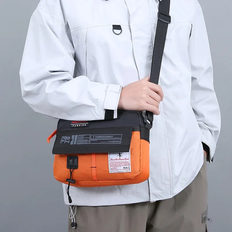 The New Single Shoulder Bag Outside The Casual Crossbody Bag Fashion Hand Nylon Color Bag for Men and Women