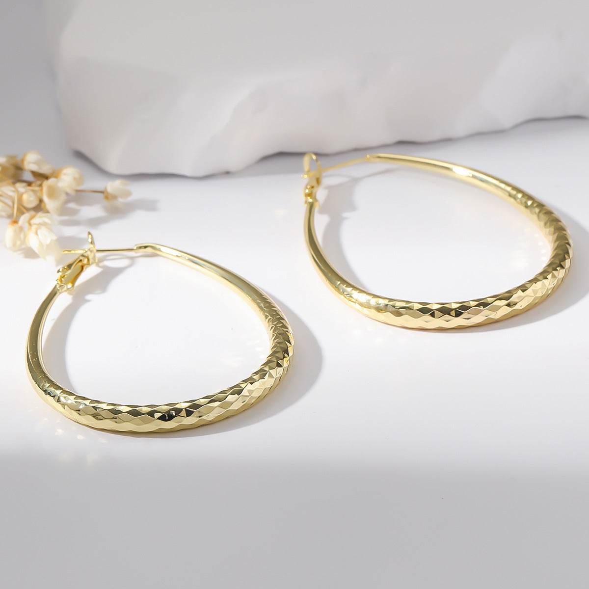 Golden Glossy Spring Fastener Egg-shaped Earrings Hypoallergenic Copper - P12 Hub Europe