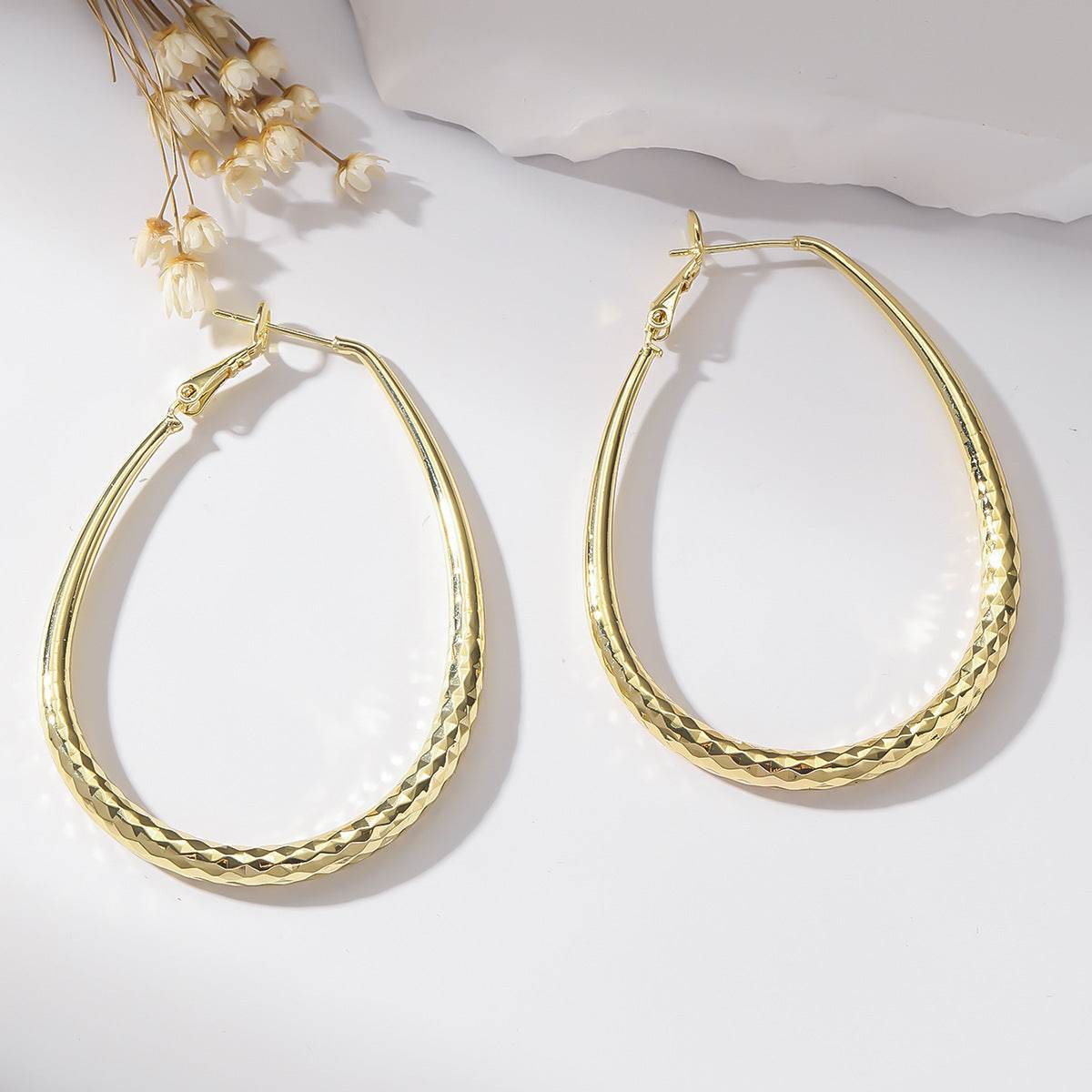 Golden Glossy Spring Fastener Egg-shaped Earrings Hypoallergenic Copper - P12 Hub Europe